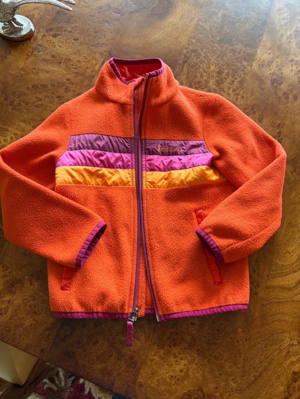 cotopaxi Orange Fleece Jacket with Pink and Yellow Stripes